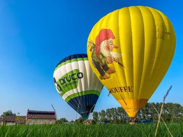 Bruco en Chouffe luchtballon samen in Beervelde - Filva Ballonvaarten Gent